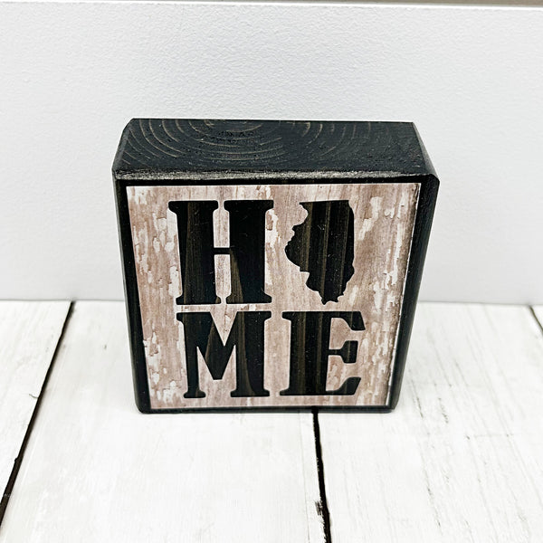 3 inch brown and white wood block with Illinois home top